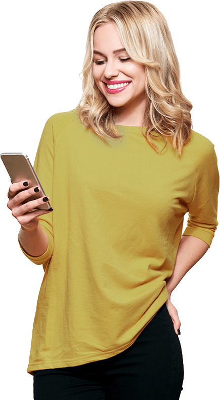 persona-_0000_GettyImages-1057104560 woman smiling at her mobile phone